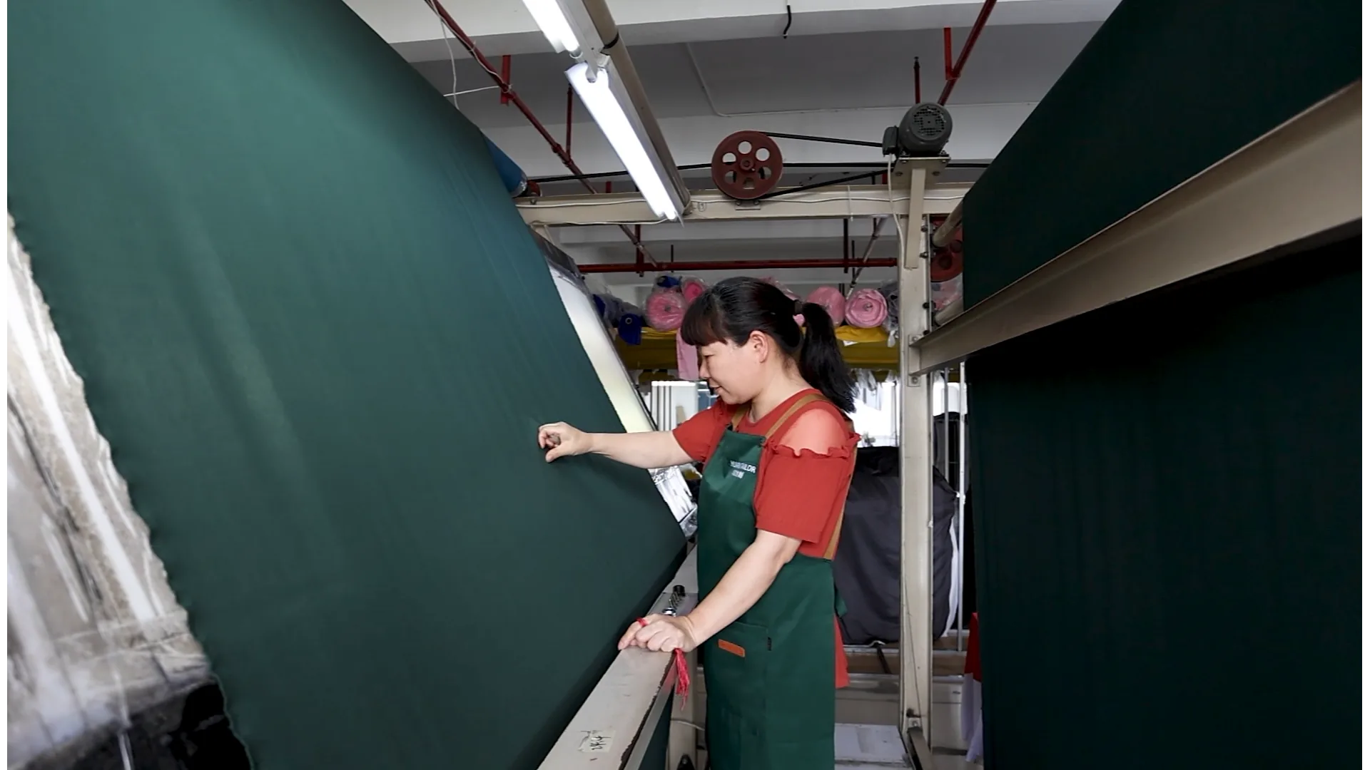 Fabric spreading and cutting